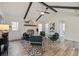 Bright living room with vaulted ceilings, unique decor, fireplace, and open floor plan at 303 Longleaf Rd, Summerville, SC 29486