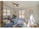 Cozy living area with plush seating, a playful teepee, and ample natural light from the sliding glass doors at 303 Longleaf Rd, Summerville, SC 29486