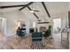 Spacious living room featuring high ceilings, beams, fireplace and contemporary furnishings at 303 Longleaf Rd, Summerville, SC 29486