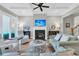 Living area with fireplace and access to backyard patio at 4028 Capensis Ln, Hollywood, SC 29470