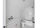 This bathroom features modern fixtures and finishes, including a sink vanity and tub with tiled surround at 7210 Raw Dew Dr, Awendaw, SC 29429