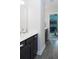 Double vanity bathroom with dark brown cabinets at 778 Opal Wing St, Moncks Corner, SC 29461