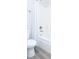 Bathroom with shower/tub combo and gray tile floor at 778 Opal Wing St, Moncks Corner, SC 29461