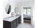 Elegant bathroom with double vanity and marble countertops at 778 Opal Wing St, Moncks Corner, SC 29461