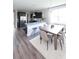 Modern kitchen with island, stainless steel appliances, and eat-in area at 778 Opal Wing St, Moncks Corner, SC 29461