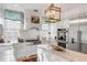 Modern kitchen with white cabinets, stainless steel appliances, and granite counters at 79 Alexander St, Charleston, SC 29403