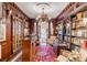 Spacious library with built-in bookshelves and a charming sitting area at 79 Alexander St, Charleston, SC 29403