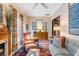 Elegant living room featuring hardwood floors, a fireplace, and comfortable seating at 79 Alexander St, Charleston, SC 29403
