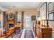 Cozy living room with a fireplace, hardwood floors, and colorful curtains at 79 Alexander St, Charleston, SC 29403