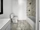 Bathroom with marble-look shower and tile flooring at 110 Manchester Rd, Summerville, SC 29486