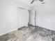 Bedroom with white closet doors and marble-look flooring at 110 Manchester Rd, Summerville, SC 29486