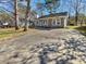 Cute ranch home with stone accents and a large driveway at 110 Manchester Rd, Summerville, SC 29486