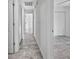 Bright hallway with tile flooring and access to bedrooms at 110 Manchester Rd, Summerville, SC 29486