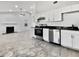 Modern kitchen with stainless steel appliances and white cabinets at 110 Manchester Rd, Summerville, SC 29486