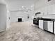 Bright kitchen with stainless steel appliances and white shaker cabinets at 110 Manchester Rd, Summerville, SC 29486