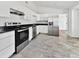 Modern kitchen with stainless steel appliances and granite countertops at 110 Manchester Rd, Summerville, SC 29486