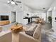 Open living room and kitchen with modern appliances and flooring at 110 Manchester Rd, Summerville, SC 29486