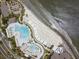 Aerial view of resort pool area and beach access at 1116 Summerwind Ln, Seabrook Island, SC 29455