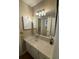 Bathroom vanity with a large mirror and single sink at 1116 Summerwind Ln, Seabrook Island, SC 29455