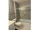 Bathroom with tub/shower combo and patterned wall at 1116 Summerwind Ln, Seabrook Island, SC 29455