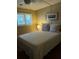 Bedroom with a double bed and window with blinds at 1116 Summerwind Ln, Seabrook Island, SC 29455