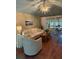 Spacious living room with hardwood floors and a fireplace at 1116 Summerwind Ln, Seabrook Island, SC 29455
