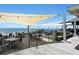 Oceanfront dining with shade and comfortable seating at 1116 Summerwind Ln, Seabrook Island, SC 29455