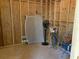 Unfinished storage area with a bicycle and fan at 1116 Summerwind Ln, Seabrook Island, SC 29455