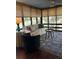 Relaxing sunroom with golf course views and comfortable seating at 1116 Summerwind Ln, Seabrook Island, SC 29455