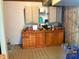 Workshop with wooden cabinets and workbench at 1116 Summerwind Ln, Seabrook Island, SC 29455
