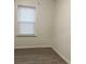 Bright bedroom with window and light grey flooring at 114 Groves St, Walterboro, SC 29488