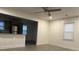 Bright living room with hardwood floors and an open concept kitchen at 114 Groves St, Walterboro, SC 29488