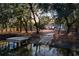 Charming home with a spacious backyard, private dock, and water access at 1216 Taliaferro Ave, Charleston, SC 29412