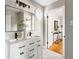 Clean bathroom with double vanity and hexagon tile floors at 1216 Taliaferro Ave, Charleston, SC 29412