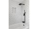 Modern bathroom with white subway tile and black fixtures at 1216 Taliaferro Ave, Charleston, SC 29412