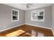 Bright bedroom featuring hardwood floors and large windows at 1216 Taliaferro Ave, Charleston, SC 29412