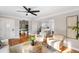 Open concept living room with views into the kitchen and a cozy seating area at 1216 Taliaferro Ave, Charleston, SC 29412