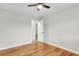 Simple bedroom with hardwood floors and an open door at 127 Roberts Rd, Summerville, SC 29483