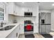 Modern kitchen with stainless steel appliances and white cabinets at 127 Roberts Rd, Summerville, SC 29483