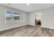 Spacious living room with large window and wood-look flooring at 127 Roberts Rd, Summerville, SC 29483