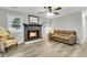 Cozy living room with a fireplace and hardwood floors at 127 Roberts Rd, Summerville, SC 29483