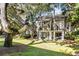 Two-story condo with private balcony and lush landscaping at 162 High Hammock Villas, Seabrook Island, SC 29455