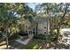 Two-story condo with private entrance and tree-lined street at 162 High Hammock Villas, Seabrook Island, SC 29455