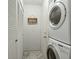 Convenient laundry room with side-by-side washer and dryer, and extra storage at 162 High Hammock Villas, Seabrook Island, SC 29455