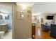 Open living room with a view of the dining area and a glimpse of the bathroom at 162 High Hammock Villas, Seabrook Island, SC 29455