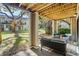 Spacious patio with covered wooden beams and comfortable seating at 162 High Hammock Villas, Seabrook Island, SC 29455