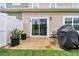 Private back patio with sliding glass door access and grill at 162 Kirkland St, Goose Creek, SC 29445