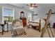 Bedroom with a queen bed, chair, and ample natural light at 162 Kirkland St, Goose Creek, SC 29445