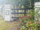 The Cokers Common community entrance framed by a blooming rose bush at 162 Kirkland St, Goose Creek, SC 29445