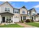 Row of townhomes showcasing a variety of exterior finishes and landscaping at 162 Kirkland St, Goose Creek, SC 29445